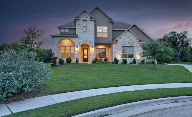 707 Campino Dr, Cedar Park, TX 78613 - craftsman inspired home with stone siding, stucco siding, a lawn, and a standing seam roof