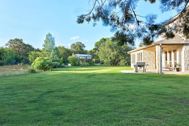 707 Campino Dr, Cedar Park, TX 78613 - view of green lawn with a patio area