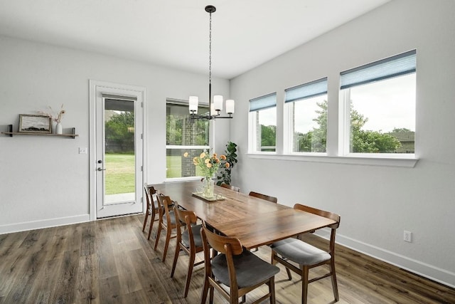409 July Johnson Dr, Austin, TX 78737 - dining space featuring a chandelier and wood finished floors