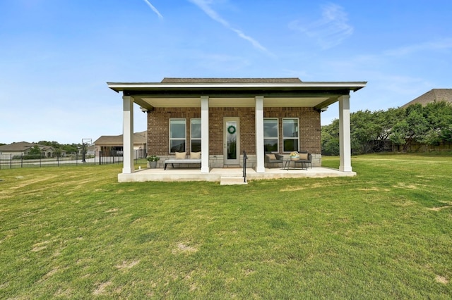 409 July Johnson Dr, Austin, TX 78737 - rear view of property featuring brick siding and a patio area