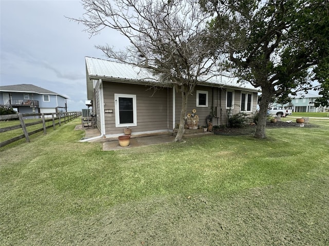 549 Marshall Johnson Ave S, Port Lavaca, TX 77979 - back of house with a metal roof and a patio