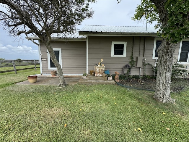 549 Marshall Johnson Ave S, Port Lavaca, TX 77979 - back of house with a patio and a metal roof