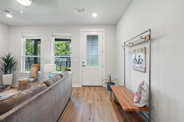 1125 Tillery St Unit 1A, Austin, TX 78702 - entryway with light wood-style floors and recessed lighting