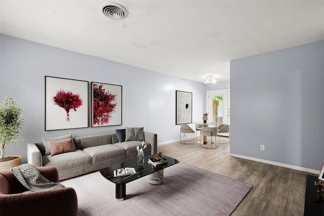 2021 Wheless Ln, Austin, TX 78723 - living room featuring wood finished floors and baseboards
