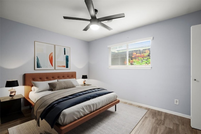 2021 Wheless Ln, Austin, TX 78723 - bedroom featuring wood finished floors and ceiling fan