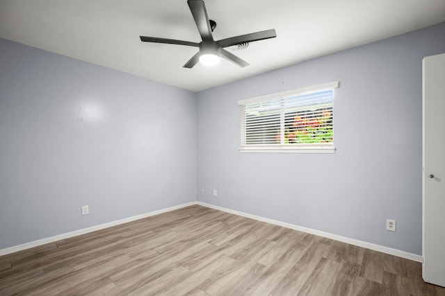 2021 Wheless Ln, Austin, TX 78723 - spare room with wood finished floors and a ceiling fan