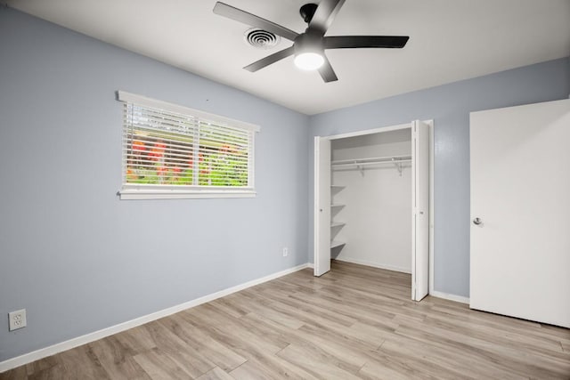 2021 Wheless Ln, Austin, TX 78723 - unfurnished bedroom with light wood-type flooring, a ceiling fan, and a closet