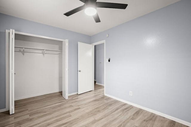 2021 Wheless Ln, Austin, TX 78723 - unfurnished bedroom with wood finished floors, a closet, and a ceiling fan