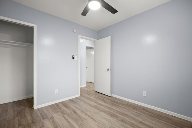 2021 Wheless Ln, Austin, TX 78723 - unfurnished bedroom featuring wood finished floors, a closet, and a ceiling fan