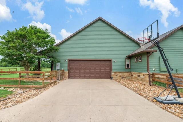 9769 Fm 1361, Snook, TX 77879 - view of property exterior with driveway and a garage
