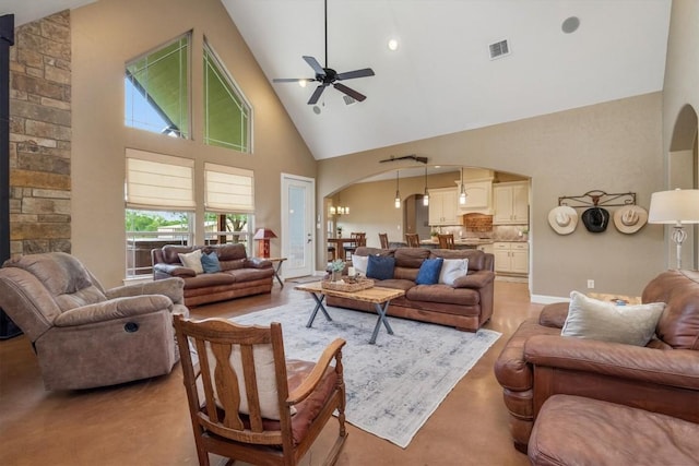 9769 Fm 1361, Snook, TX 77879 - living area with arched walkways, high vaulted ceiling, ceiling fan, and finished concrete flooring