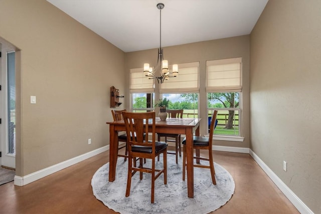 9769 Fm 1361, Snook, TX 77879 - dining area featuring finished concrete flooring, a chandelier, and plenty of natural light