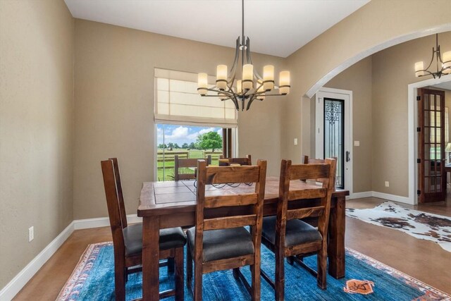 9769 Fm 1361, Snook, TX 77879 - dining area featuring a chandelier and arched walkways