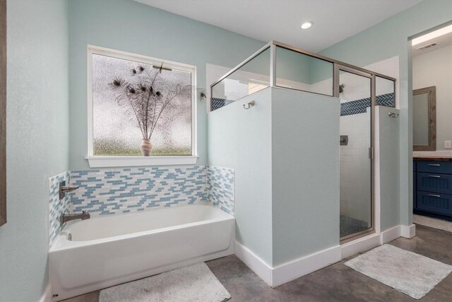 9769 Fm 1361, Snook, TX 77879 - full bath with a stall shower, a bath, vanity, and finished concrete flooring