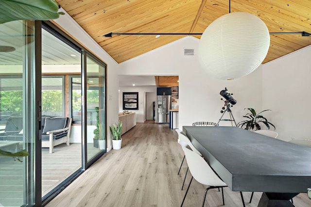 6101 Bridlington Cir, Austin, TX 78745 - dining area featuring wooden ceiling, lofted ceiling, and light wood finished floors