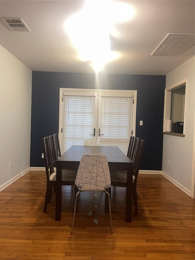 2003 Woodmont Ave, Austin, TX 78703 - dining space with wood finished floors