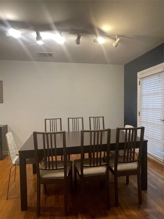 2003 Woodmont Ave, Austin, TX 78703 - dining room with track lighting and wood finished floors