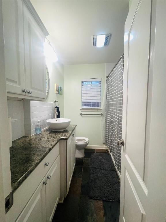 2003 Woodmont Ave, Austin, TX 78703 - bathroom with vanity, decorative backsplash, and a shower with curtain