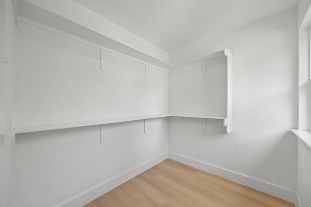 161 Honopu Dr, Bastrop, TX 78602 - spacious closet with light wood finished floors