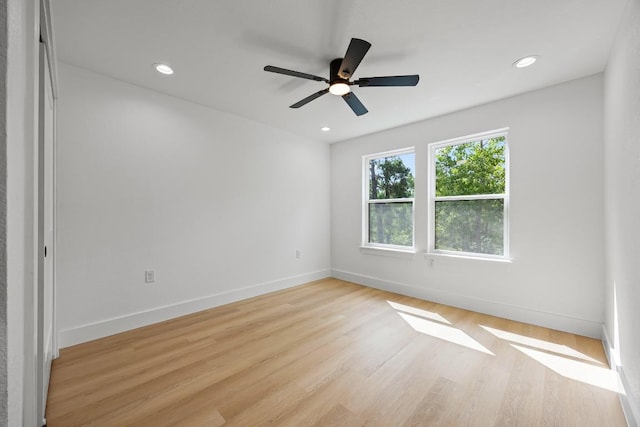 161 Honopu Dr, Bastrop, TX 78602 - spare room featuring light wood finished floors, a ceiling fan, and recessed lighting