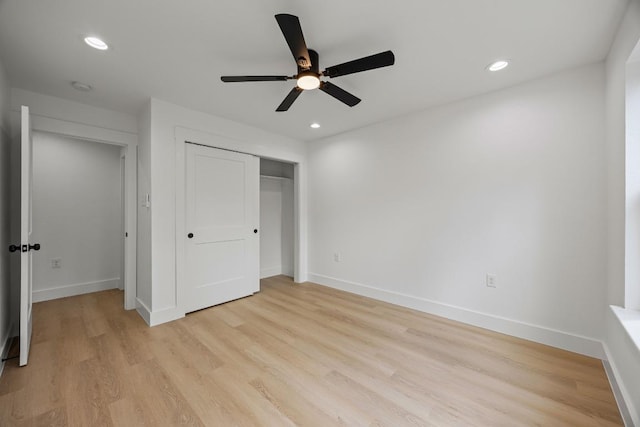 161 Honopu Dr, Bastrop, TX 78602 - unfurnished bedroom featuring light wood-type flooring, a closet, recessed lighting, and a ceiling fan