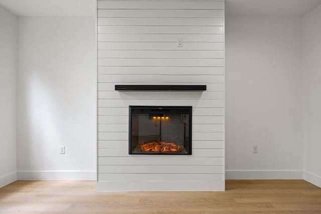 161 Honopu Dr, Bastrop, TX 78602 - detailed view of a large fireplace and wood finished floors