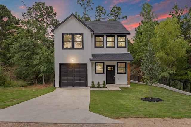 161 Honopu Dr, Bastrop, TX 78602 - view of front of property with a shingled roof, a garage, concrete driveway, and board and batten siding