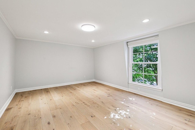 5 Green Ln, Austin, TX 78703 - spare room with light wood-style flooring, ornamental molding, and recessed lighting