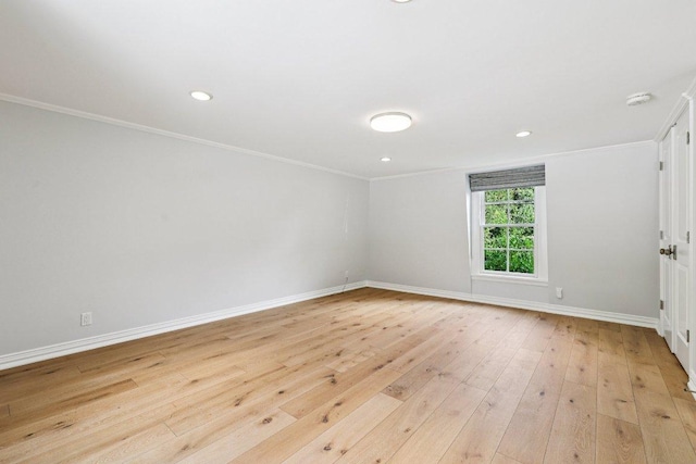 5 Green Ln, Austin, TX 78703 - empty room with crown molding, light wood finished floors, and recessed lighting