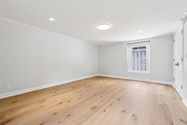 5 Green Ln, Austin, TX 78703 - unfurnished room with light wood-style flooring, ornamental molding, and recessed lighting