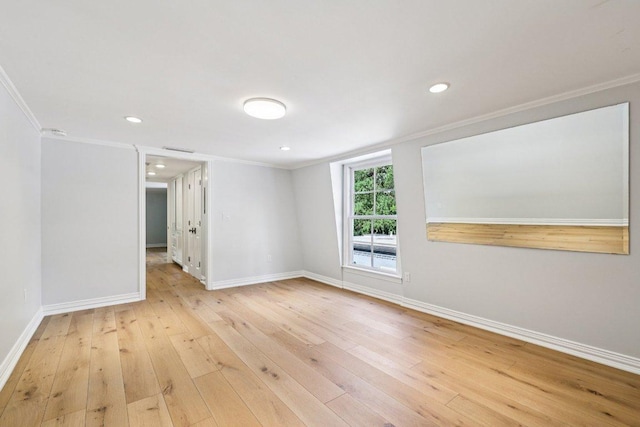5 Green Ln, Austin, TX 78703 - spare room with ornamental molding, light wood-style floors, and recessed lighting
