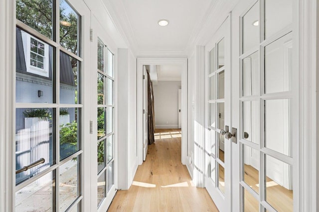 5 Green Ln, Austin, TX 78703 - hall featuring french doors, crown molding, light wood finished floors, and recessed lighting