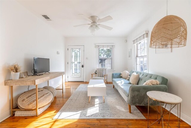 1028 E 43rd St, Austin, TX 78751 - living room with hardwood / wood-style floors and ceiling fan
