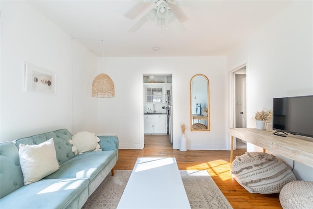 1028 E 43rd St, Austin, TX 78751 - living area featuring light wood-style floors and a ceiling fan