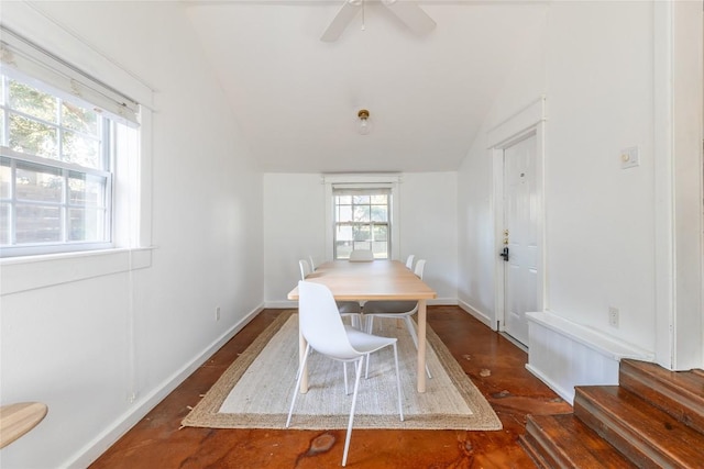 1028 E 43rd St, Austin, TX 78751 - dining space with lofted ceiling, ceiling fan, dark wood-style floors, and stairs