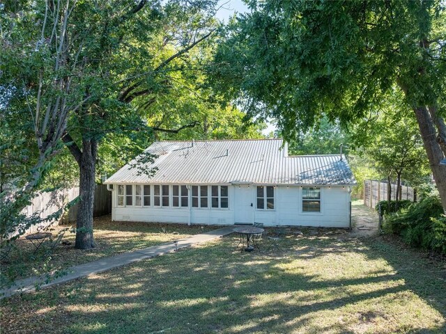 1028 E 43rd St, Austin, TX 78751 - back of property with a metal roof