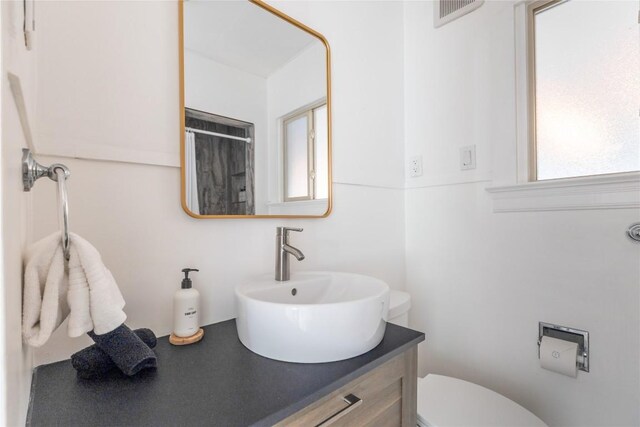1028 E 43rd St, Austin, TX 78751 - bathroom featuring vanity and a shower