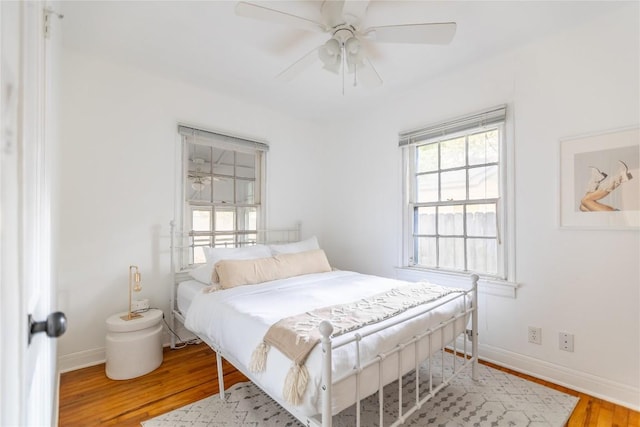 1028 E 43rd St, Austin, TX 78751 - bedroom featuring wood finished floors and ceiling fan