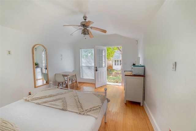 1028 E 43rd St, Austin, TX 78751 - bedroom featuring access to outside, lofted ceiling, light wood-type flooring, and a ceiling fan