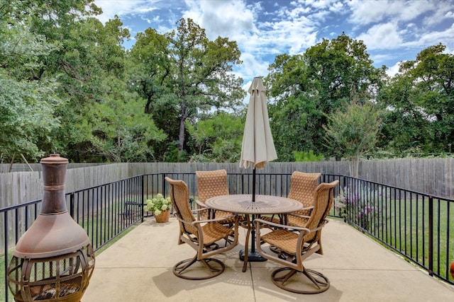 11125 Cap Stone Dr, Austin, TX 78739 - view of patio with outdoor dining area