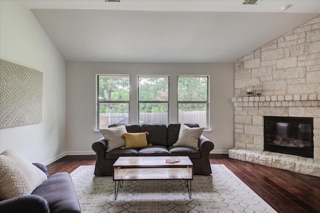 11125 Cap Stone Dr, Austin, TX 78739 - living room featuring lofted ceiling, healthy amount of natural light, dark wood-style floors, and a fireplace