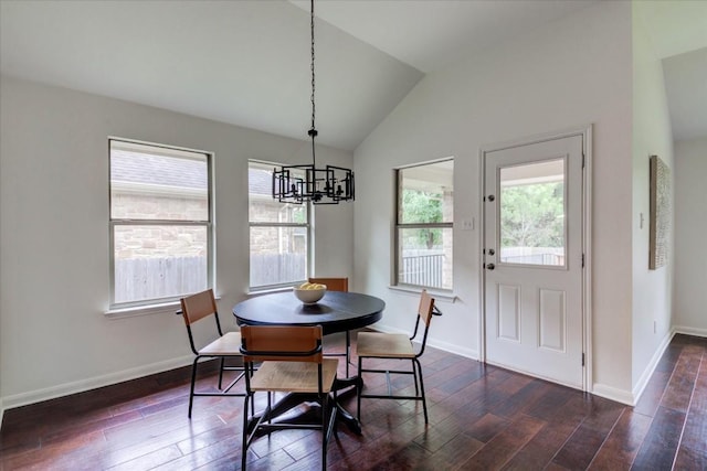 11125 Cap Stone Dr, Austin, TX 78739 - dining room featuring a chandelier, vaulted ceiling, and dark wood-style floors