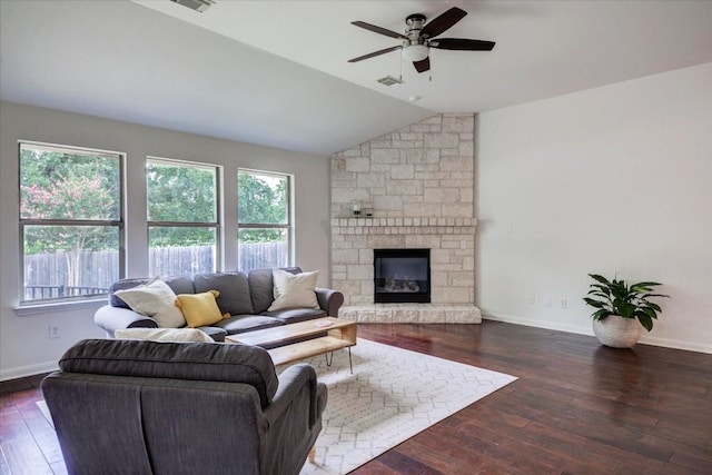 11125 Cap Stone Dr, Austin, TX 78739 - living area with vaulted ceiling, ceiling fan, hardwood / wood-style floors, and a stone fireplace
