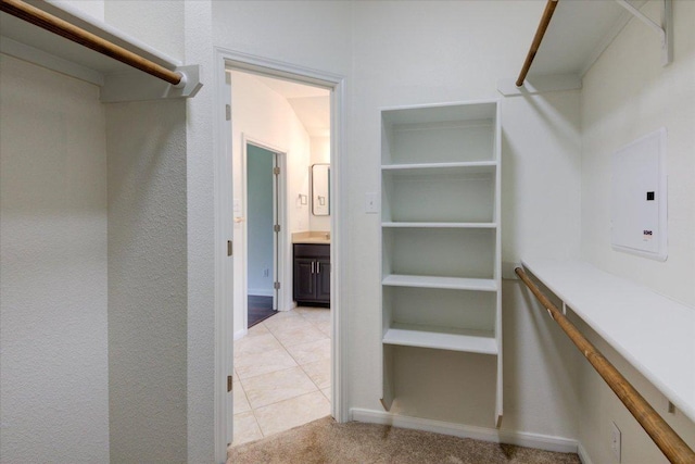11125 Cap Stone Dr, Austin, TX 78739 - spacious closet with light tile patterned floors