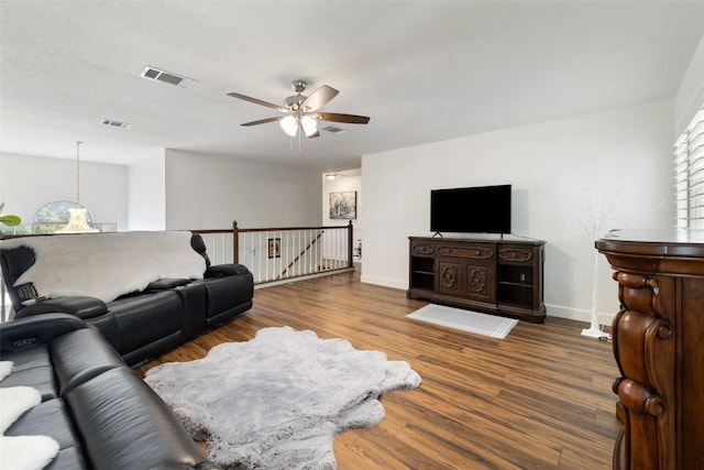 1004 Oaklands Dr, Round Rock, TX 78681 - living area with a ceiling fan and wood finished floors