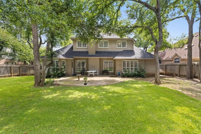 1004 Oaklands Dr, Round Rock, TX 78681 - rear view of property featuring a patio area, a fenced backyard, and a shingled roof