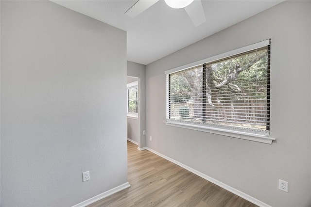 11309 Timbrook Trl, Austin, TX 78750 - empty room with wood finished floors and a ceiling fan