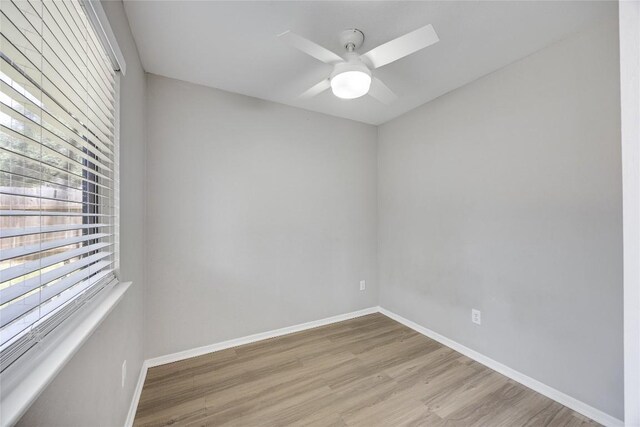11309 Timbrook Trl, Austin, TX 78750 - spare room with wood finished floors and a ceiling fan
