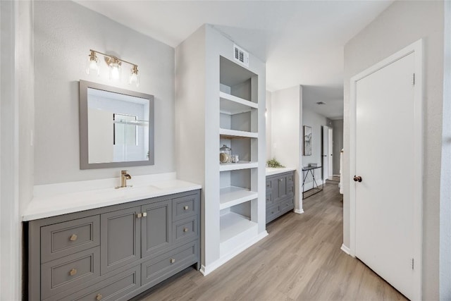 11309 Timbrook Trl, Austin, TX 78750 - bathroom with vanity and wood finished floors