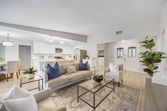 11309 Timbrook Trl, Austin, TX 78750 - living area featuring light wood-style floors and baseboards